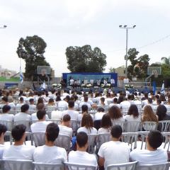 Image may contain: one or more people, crowd and outdoor